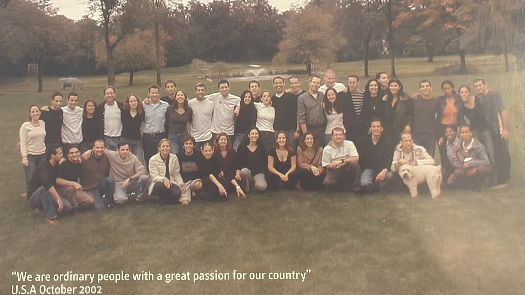 Dozens of Israel at Heart volunteers and delegates gathered for a group photo on a lawn, 2002.