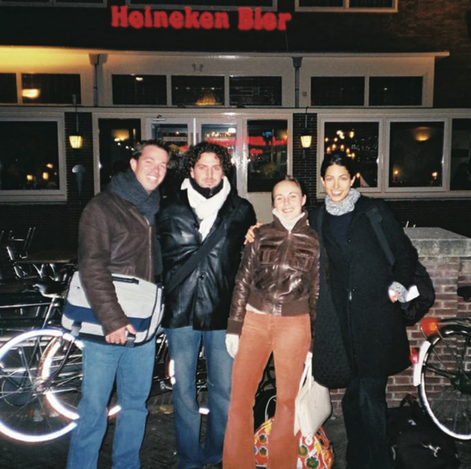 A delegation of young Israelis on a street in Amsterdam at night.