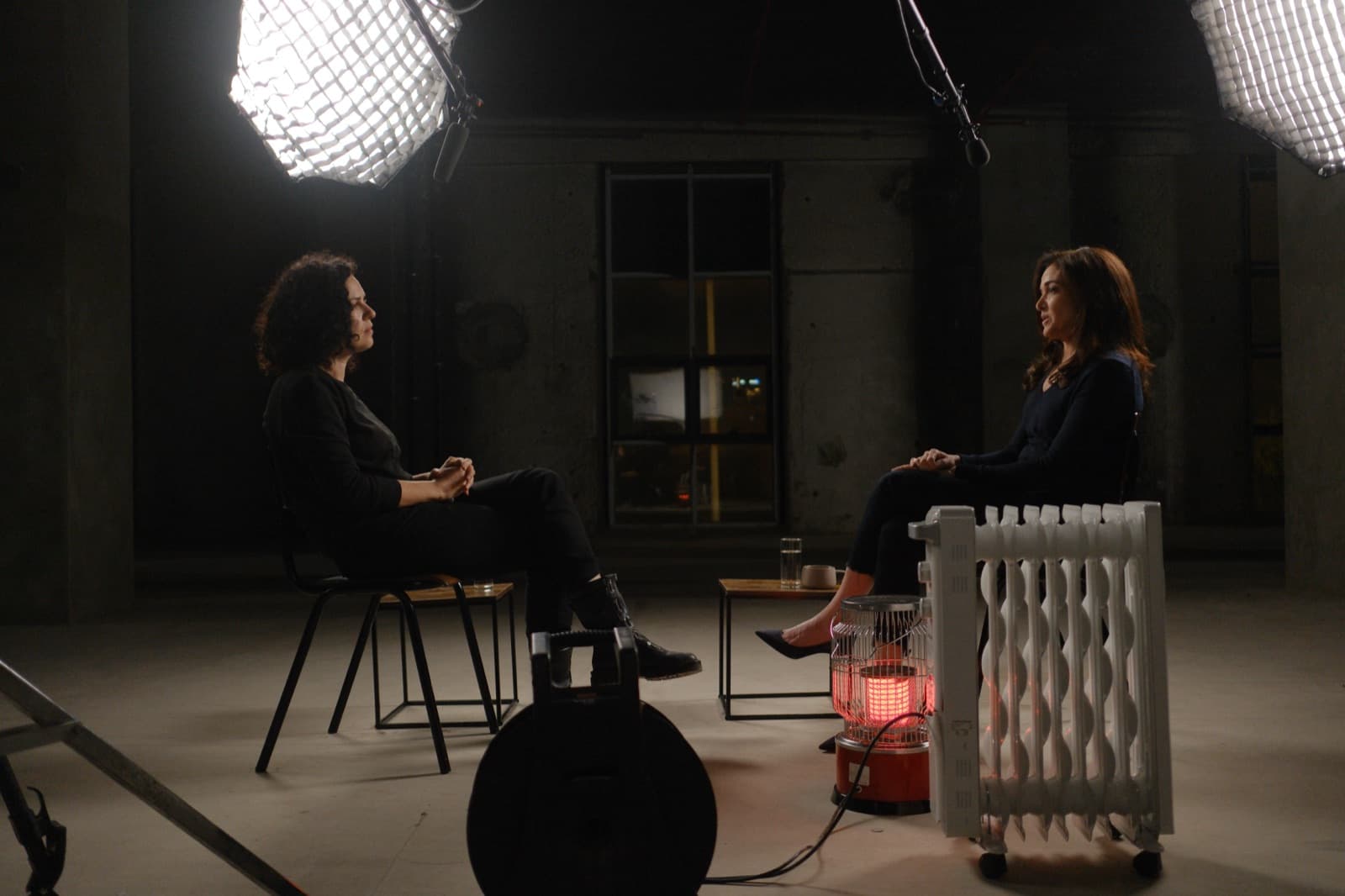 Sheryl Sandberg and director Anat Stalinsky seated across from each other on the interview set.