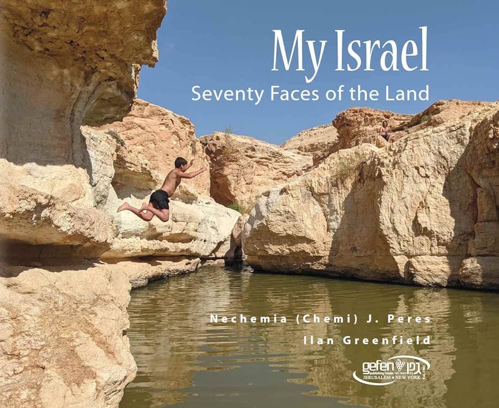 The cover of My Israel: Seventy Faces of the Land, a photograph of a desert canyon and pool.
